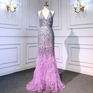 Amethyst Allure: Purple Mermaid Gown with Spaghetti Straps, Luxury Feathers, and Shiny Beads – 2024 Women’s Evening Elegance