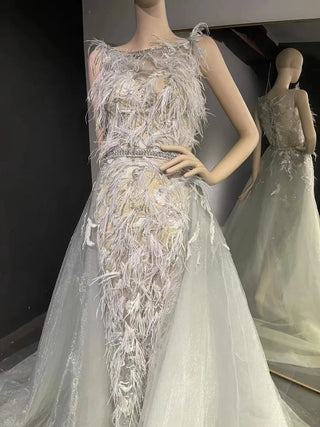 QUEENS DUBAI: Feathery Finesse - Mermaid Ostrich Feather Boat Neck Sleeveless Costume Dress with Detachable Train for a Mesmerizing Fashion Show Ensemble