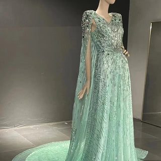 QUEENS DUBAI: Mint Marvel - A-Line V Neck Bead Rhinestone Stage Costume Dress with Cape Fashion Show Dress